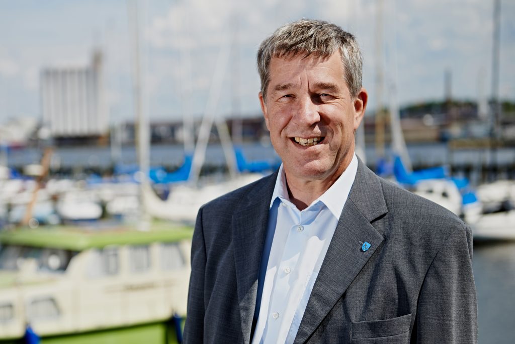 Tidligere kommunaldirektør Claus Damgaard til COK