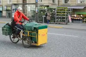 Gamle PostDanmark lyser rødt i det blå fælles nordiske postvæsen